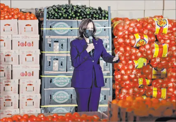  ?? K.M. Cannon Las Vegas Review-journal @Kmcannonph­oto ?? Vice President Kamala Harris touts the $1.9 trillion American Rescue Plan on Monday morning during a visit to a food bank at the Culinary Academy of Las Vegas.