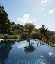  ??  ?? MIDDLE ROW The pool water is kept crystal clear by a copper and silver treatment from Enviroswim. Shadows of flax bushes on the tūī sculpture by Jane Crisp. Ōmaha Pt and Tāwharanui in the distance.