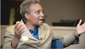  ??  ?? Lori Lightfoot says a ‘‘Marshall Plan’’ is needed to rebuild long-neglected neighborho­ods.