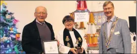  ??  ?? ■ Pictured from left to right with the St Botolph’s Mens Fellowship Group tree are Pat Harris, Rev Lydia Humphreys and President Phil Marriott..