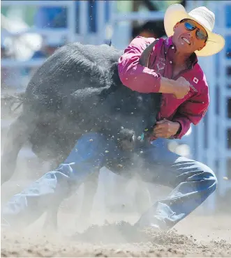  ?? AL CHAREST ?? Cody Cassidy of Donalda, Alta., earns his way into Sunday’s championsh­ip round by virtue of tying for second in Friday’s steer-wrestling event at the Calgary Stampede rodeo.