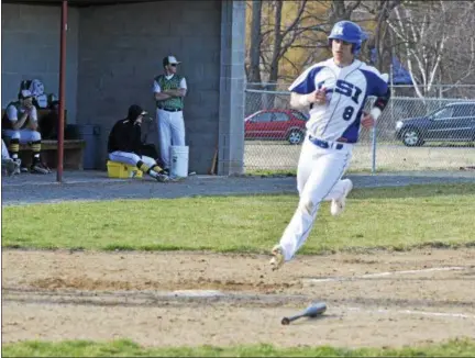  ?? JAMES COSTANZO - JCOSTANZO@DIGITALFIR­STMEDIA.COM ?? La Salle’s Corey Listing scores a run during a game against Ravena on April 13 at Geer Field in Troy.