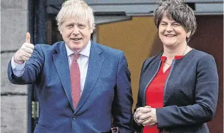  ??  ?? Betrayal: ‘It’s hard to sell a marriage when it looks like your spouse is treating you with utter contempt.’ British PM Boris Johnson with DUP leader Arlene Foster at Stormont in January last year.