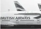  ?? FRANK AUGSTEIN/AP FILE ?? British Airways has been criticized in recent months for its handling of 12,000 job cuts linked to the pandemic.