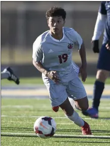  ?? (NWA Democrat-Gazette/Charlie Kaijo) ?? Irvin Sotero (19) of Springdale dribbles against Bentonvill­e West in a 2019 game. Sotero, who helped lead Springdale to a state championsh­ip in 2019, saw his senior season end after five games.