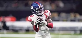  ?? Brett Duke / Associated Press ?? New York Giants wide receiver Darius Slayton warms up before a game against the New Orleans Saints in New Orleans on Oct. 3.