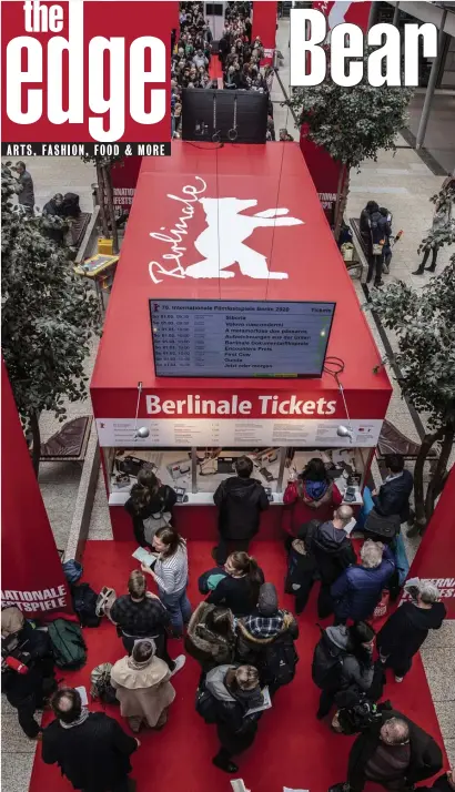  ?? AP ?? ANTICIPATI­ON: People line up in front of ticket booths for the Berlin Internatio­nal Film Festival in Berlin, Germany, which opens Thursday.
