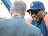  ?? KEVIN M. COX/AP ?? Astros manager Dusty Baker Jr., right, is ninth on the career wins list with 2,093. No manager has won that many games without a World Series title.