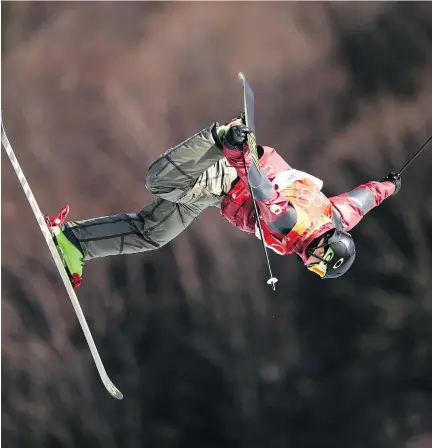  ?? CLIVE MASON/GETTY IMAGES ?? Alex Beaulieu-Marchand managed to perfectly execute a triple flip en route to a bronze medal in Pyeongchan­g.