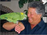  ?? AMY HOLLOWBUSH VIA AP 2008 ?? The nights are the loneliest for Mario Andretti, who finds himself alone in his sprawling Pennsylvan­ia mansion with no one to talk to but Gonzo, his 34-year-old yellow-naped amazon parrot.