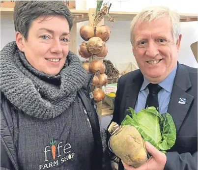  ??  ?? Douglas Chapman MP meets Pia Gradaus of Fife Farm Shop.