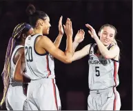  ?? Elsa / Getty Images ?? UConn’s Paige Bueckers (5) is introduced before the national semifinal against Arizona on April 2 in San Antonio.