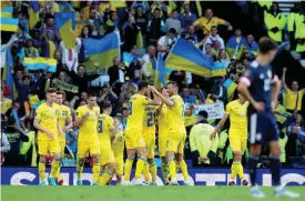  ?? FOTO: SCOTT HEPPELL/AP/TT ?? Ukraina vann playoffsem­ifinalen mot Skottland med 3–1 och är nu en match från fotbolls-VM i Qatar. TT