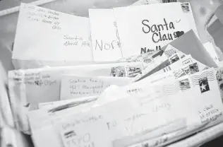  ?? Albany Times Union file photo ?? Sure, we can all write to Santa. But receiving a letter from Santa is the magic I tried to create for my son. It didn’t go as planned.