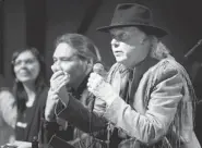  ?? JEFF MCINTOSH/Canadian Press ?? Neil Young makes a point at a news conference before the last concert in his Honour the Treaties tour Sunday in Calgary.