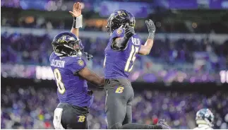  ?? MATT SLOCUM / ASSOCIATED PRESS ?? Baltimore Ravens wide receiver Nelson Agholor (15) celebrates his touchdown catch with quarterbac­k Lamar Jackson during Saturday’s AFC divisional playoff game against the Houston Texans in Baltimore.