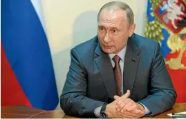  ?? PHOTO: REUTERS ?? President Vladimir Putin is promoting younger, ‘‘more deferentia­l’’ aides.