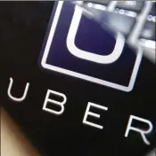  ?? TNS ?? Uber’s ridership is growing, although it is struggling to make money. The San Francisco-based company lost $891 million in the quarter ending last June.