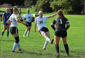  ?? AUSTIN HERTZOG - DIGITAL FIRST MEDIA ?? Kutztown senior Niki Nolte (35) shoots and scores the opening goal of the Cougars’ cancer awareness game against Oley Valley on Sept. 11.