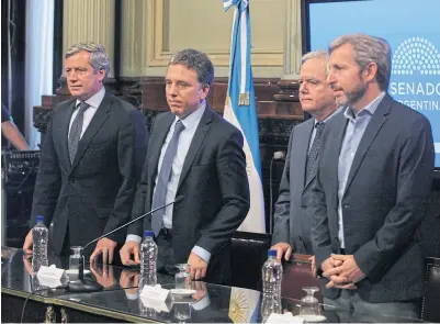  ?? Pablo molina / dyn ?? Monzó, Dujovne, Pinedo y Frigerio, en la presentaci­ón de ayer