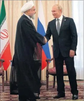 ?? / A. D. (AP) ?? Hasan Rohani y Vladímir Putin, ayer en Biskhek (Kirguistán).