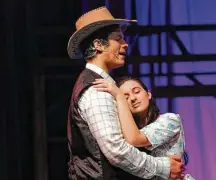  ?? Carol Kaliff / Hearst Connecticu­t Media ?? Jack Garvey plays Curly and Marina Kolitsas plays Laurey Williams in Immaculate High School's spring musical “Oklahoma!” in Danbury, Conn.