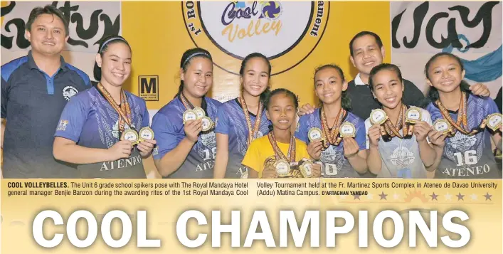  ??  ?? COOL VOLLEYBELL­ES. The Unit 6 grade school spikers pose with The Royal Mandaya Hotel general manager Benjie Banzon during the awarding rites of the 1st Royal Mandaya Cool Volley Tournament held at the Fr. Martinez Sports Complex in Ateneo de Davao...