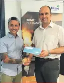  ??  ?? Mr Vella Rapa with Chris Cuschieri, Elmo Insurance Ltd General Manager receiving the €300 insurance voucher