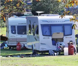 ??  ?? ‘Aggressive takeover’: Caravans parked at Ealing Common in west London
