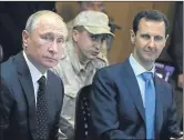  ??  ?? Vladimir Putin and Bashar al-assad