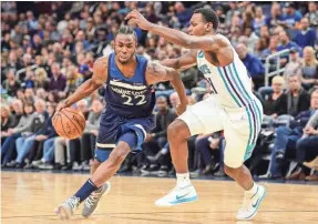  ??  ?? Forward Andrew Wiggins, left, and the Timberwolv­es have won five in a row for the first time since January 2009. JEFFREY BECKER/USA TODAY SPORTS