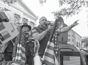  ?? Bloomberg file photo ?? Infowars founder Alex Jones speaks at a rally in Austin. In a bankruptcy filing, Infowars’ creditors include relatives of the victims of the Newtown massacre.