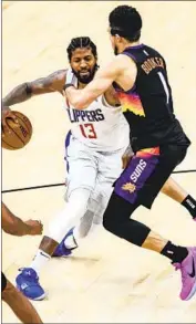  ?? Robert Gauthier Los Angeles Times ?? PAUL GEORGE, guarded by the Suns’ Devin Booker, saw his usage rate go way up last postseason.