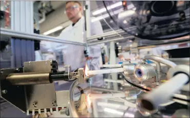  ?? PHOTO: BLOOMBERG ?? A cigarette is automatica­lly lit in a smoking machine at British American Tobacco research and developmen­t laboratori­es in South Hampton, UK. BAT’s next generation products include Vapour Products (e-cigarettes) and Tobacco Heating Products.