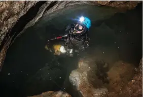  ??  ?? David Apperley prepares to face the cold water of Slug Lake. His decades of cavediving experience has made him one of the most respected diving explorers in Australia.