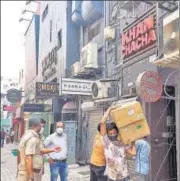  ??  ?? Police personnel during the raid at Khan Chacha restaurant in Khan Market.