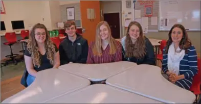 ?? FRANCINE D. GRINNELL — MEDIANEWS GROUP ?? From left, BH-BL students Samantha MacLeod, Braedon Otis, Skylar Wright, Gracie Ruzzo, and educator Nicole Passante learn to apply fiscal maturity through resources such as Banzai videos underwritt­en by the Adirondack Trust Company.