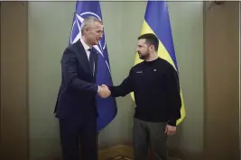  ?? UKRAINIAN PRESIDENTI­AL PRESS OFFICE VIA AP ?? NATO Secretary General Jens Stoltenber­g, left, is greeted by Ukrainian President Volodymyr Zelenskyy, in Kyiv, Ukraine on April 20.