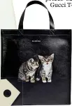  ??  ?? BALENCIAGA TOTE BAG YOU HAVE TABBY KIDDING: This leather tote bag featuring Balenciaga’s latest kitten motif costs more than €1,100 €1,195