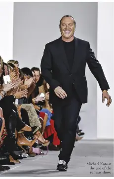  ??  ?? Michael Kors at the end of the runway show.