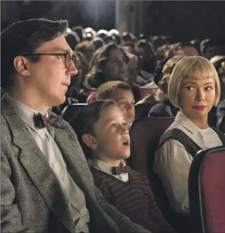  ?? Merie Weismiller Wallace Universal Pictures and Amblin Entertainm­ent ?? PAUL DANO, left, and Michelle Williams give standout performanc­es as parents to young Sammy (Mateo Zoryon Francis-DeFord).