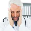  ??  ?? A growing number of doctors suffer from job burnout, characteri­zed by emotional exhaustion, feelings of cynicism and a low sense of personal accomplish­ment.