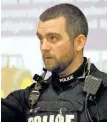  ?? JASON BAIN/EXAMINER ?? Peterborou­gh police Const. Rob Videto of the community patrol unit speaks about farm vehicle safety during a seminar at the Cavan Monaghan Township hall Thursday.