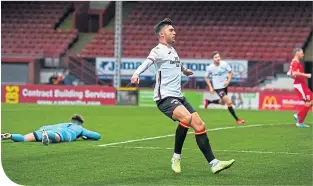  ??  ?? Partick Thistle’s Reece Cole celebrates his early goal