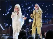  ?? EMMA MCINTYRE — GETTY IMAGES ?? Dolly Parton and Miley Cyrus perform during the 61st annual Grammy Awards at Staples Center in Los Angeles on Sunday night.