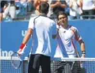  ?? AFP ?? Ferrer y Djokovic, al final del partido.