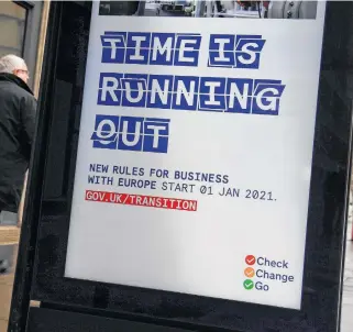  ?? TOBY MELVILLE • REUTERS ?? An electronic billboard in London on Friday displays a British government informatio­n message advising business to prepare for Brexit.