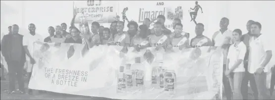  ??  ?? The victorious Fruta Conquerors U20 side celebratin­g their victory over Santos to claim the Limacol Football Championsh­ip at the Ministry of Education ground, Carifesta Avenue