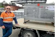  ??  ?? Allan Rose back home with the workbench he built during his spare time at Antarctica.