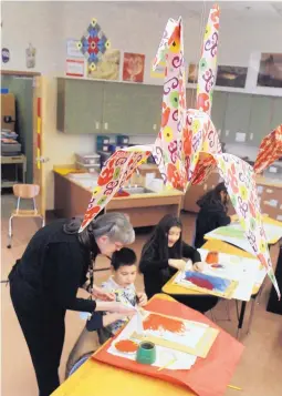  ?? GREG SORBER/JOURNAL ?? Kids began a painting project in Susan Dubois’ fifth grade art class on Monday. The class at Montezuma used to be every other year but now it will be an annual course as APS is expanding its art and music programs.